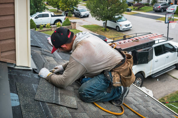 Professional Roofing technician working in Milan, IL